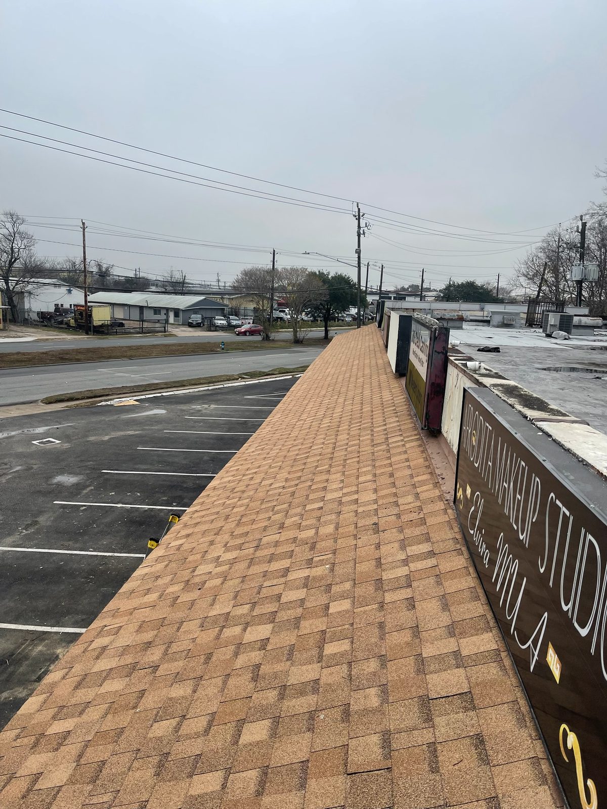 Finished new roof shingles on a commercial strip center